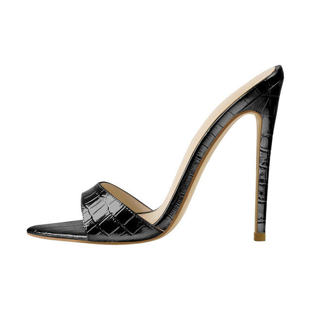Black croc-embossed faux leather mule with a pointed peep toe and a high stiletto heel, shown from the side